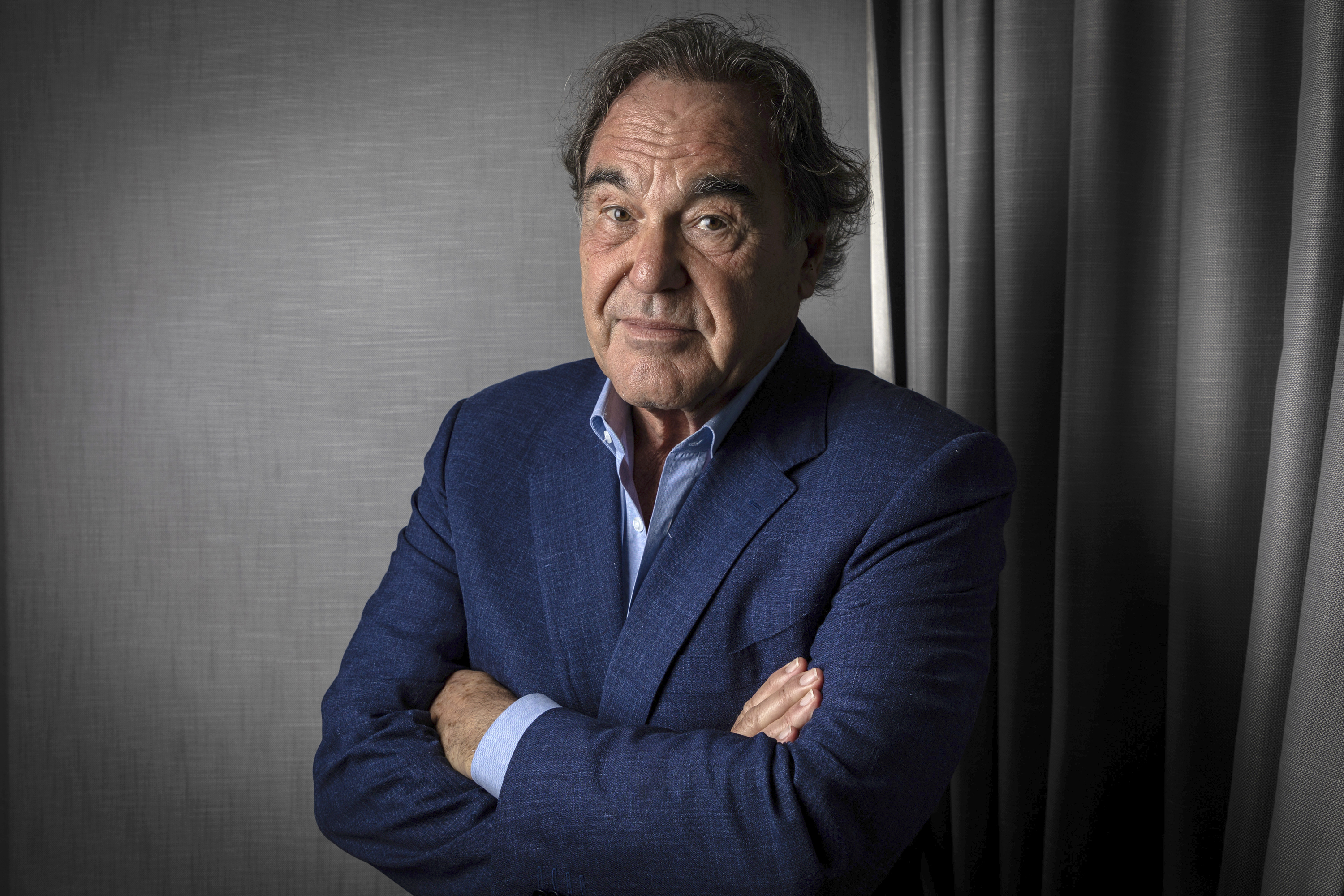 FILE - Oliver Stone poses for portrait photographs for the film 'JFK Revisited: Through the Looking Glass', at the 74th international film festival, Cannes, southern France, Sunday, July 11, 2021. (Photo by Vianney Le Caer/Invision/AP, File)