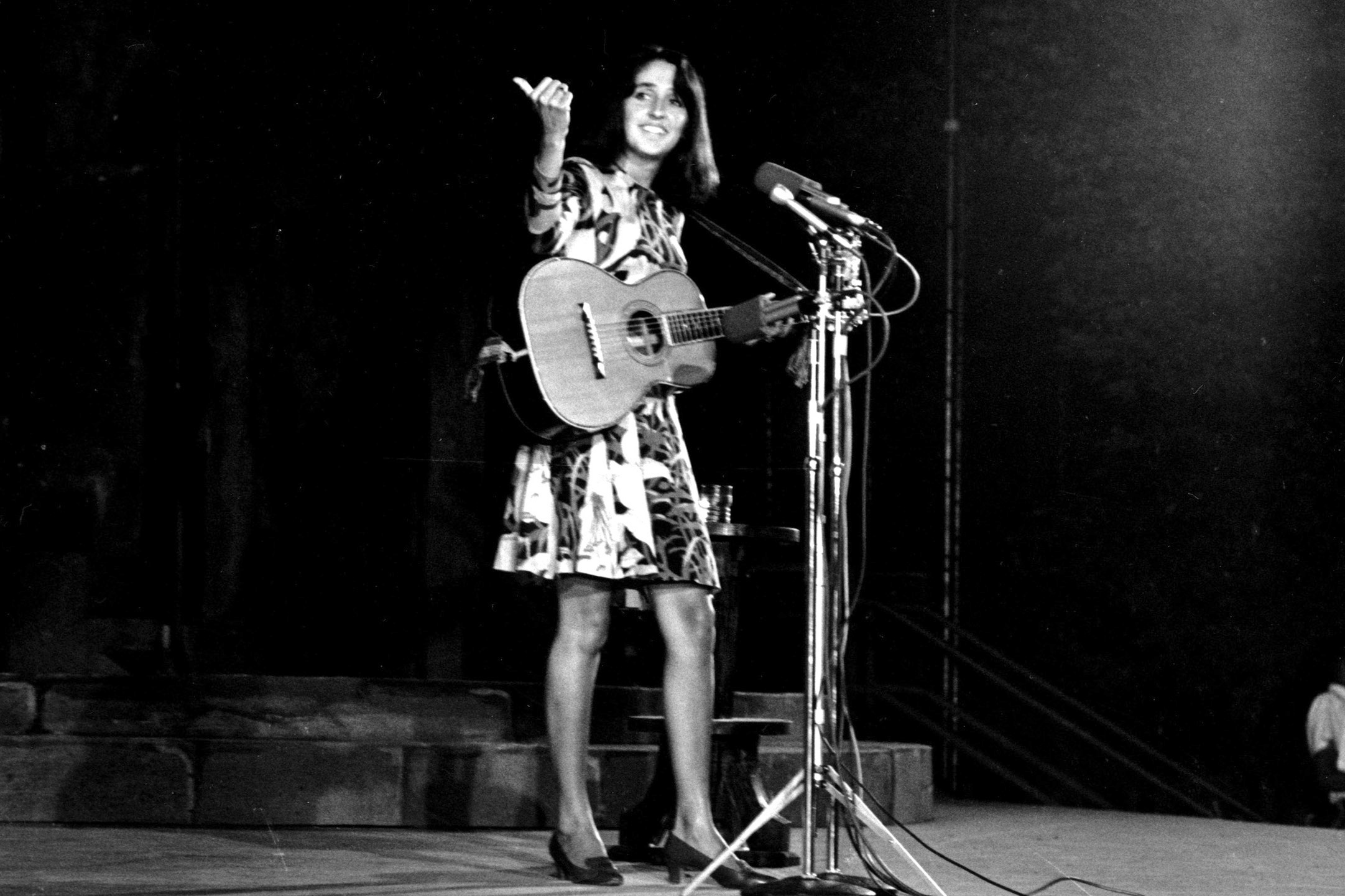 FILE - Folk singer Joan Baez performs at the Washington Monument in Washington, D.C. on Aug. 14, 1967. (AP Photo/ John Rous, File)