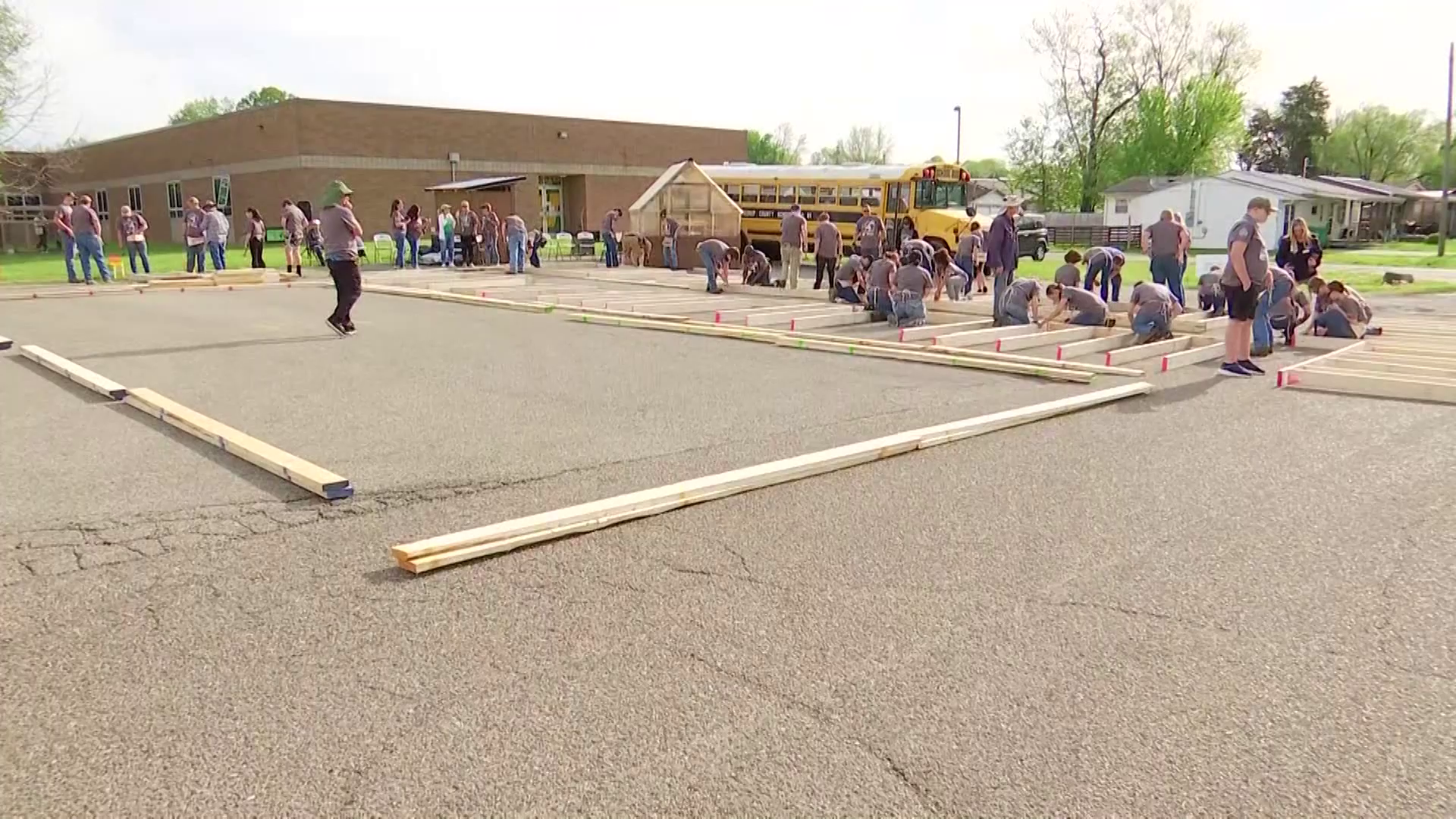 Wurtland Middle School students help build a wall for a Habitat for Humanity house. April 22, 2025 (Photo Credit: WOWK 13 News Photographer Daniel Harris)